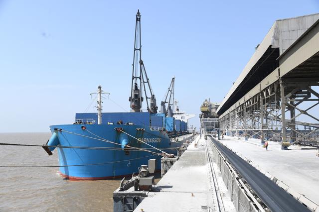 bulk cargo carrier berthed at UltraTech's Gujarat Cement Works Jetty