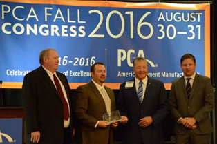 Scott receives his award from the PCA Scott receives his award from the PCA